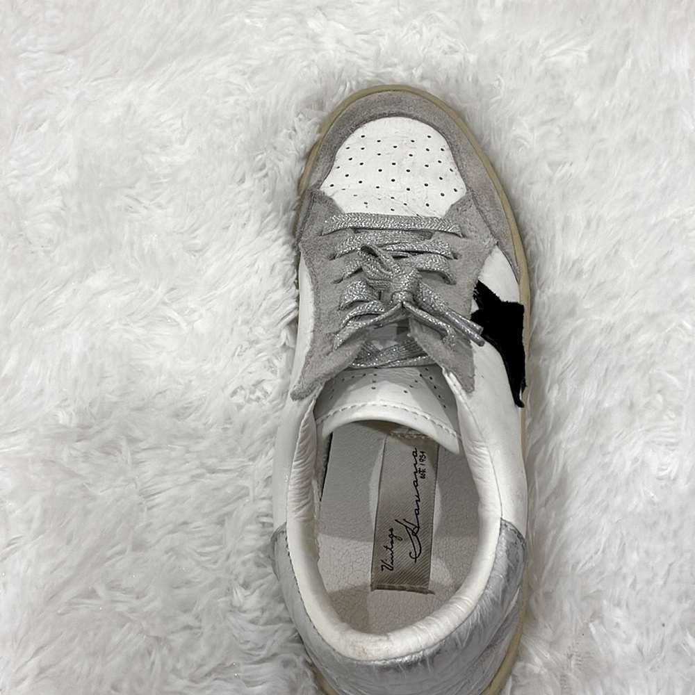 white with shimmery laces black star and snakeskin